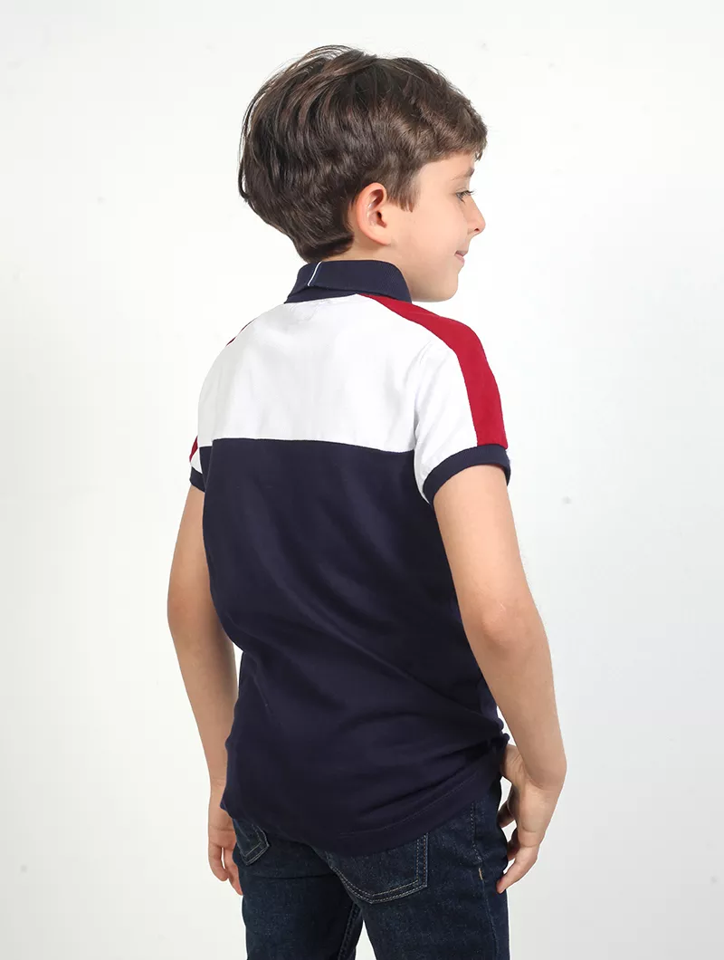 Polo garçon avec badge